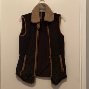 Black/brown vest